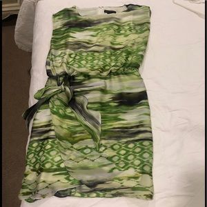 Flattering whimsical Dress with a tie at the hip